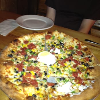 Flatbread - Jimmy's Free-Range Chicken with Jalapeno pepper (That's a dollop of sour cream in the center) - Pizza Near Me - Amesbury, Massachusetts Flatbread - Jimmy's Free-Range Chicken with Jalapeno pepper (That's a dollop of sour cream in the center) - Pizza Near Me - Amesbury, Massachusetts