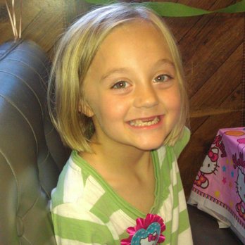 Gallina Pizza - a little girl sitting at a table - Pizza Near Me - Riverton, Illinois