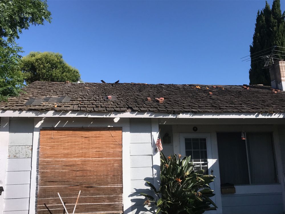 Slide of Husky Roofing