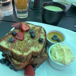 Homemade GF sourdough French toast with mango compote