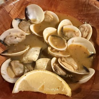 Pirates Pub & Grub - Clams (half eaten) - American Near Me - Madeira Beach, Florida Pirates Pub & Grub - Clams (half eaten) - American Near Me - Madeira Beach, Florida