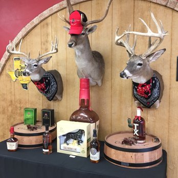 Lone Star Liquors - deer heads mounted on a wall - Beer, Wine & Spirits Near Me - San Angelo, Texas