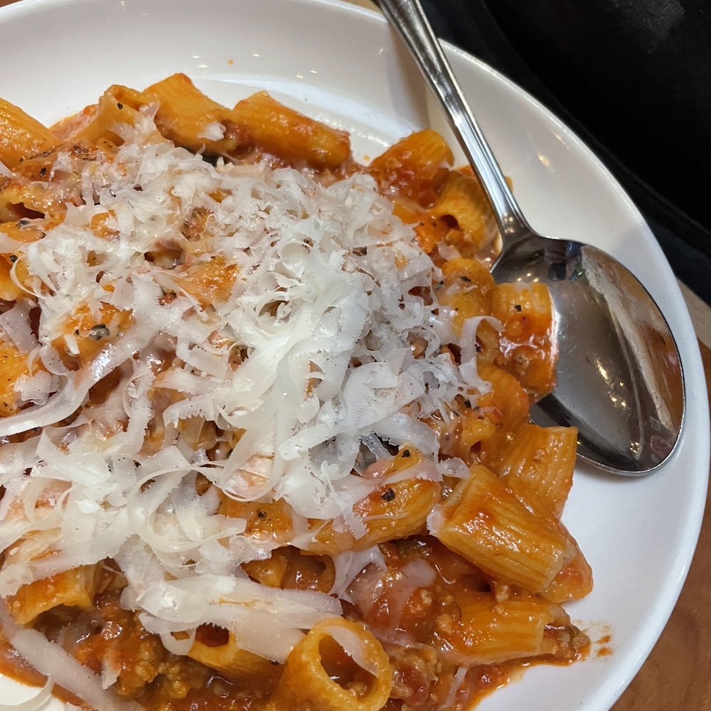 Capers + Olives - Pasta- Rigatoni bolognese, mascarpone and mint in a flavorful tomato crème sauce. - Italian Near Me - Everett, Washington
