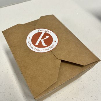Kunafa's - a brown envelope with a sticker on it - Desserts Near Me - Toronto, Ontario Kunafa's - a brown envelope with a sticker on it - Desserts Near Me - Toronto, Ontario