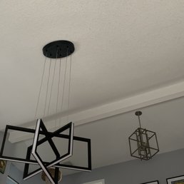 New fixture is in the left-the sloped ceiling and multiple wires on the fixture made this a challenge -but well done! New fixture is in the left-the sloped ceiling and multiple wires on the fixture made this a challenge -but well done!