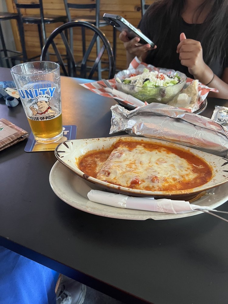 Unity House of Pizza Logo