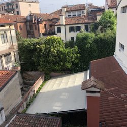 Art Hotel Al Fagiano - View from room.   Can see little patio for breakfast
