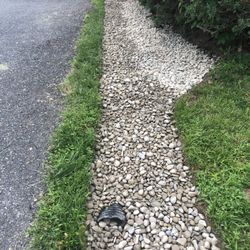 Graded, stoned drainage area