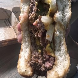 a person holding a hot dog a person holding a hot dog