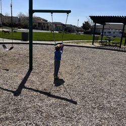 Quail Run Park - Pushing the basket ball in the bucket swing
