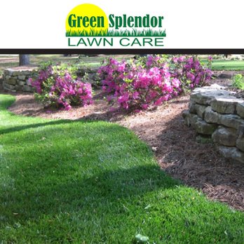 Green Splendor Lawn Care - a stone wall with flowers in the background - Lawn Services Near Me - Monroe, Georgia Green Splendor Lawn Care - a stone wall with flowers in the background - Lawn Services Near Me - Monroe, Georgia