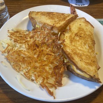 Denny's Restaurant Fleetwood - a plate with a sandwich and hash browns - Breakfast & Brunch Near Me - Surrey, British Columbia