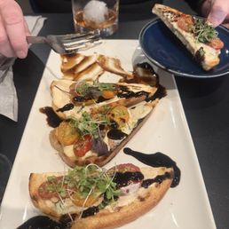 Goat Cheese Bruschetta with micro greens and balsamic glaze Goat Cheese Bruschetta with micro greens and balsamic glaze