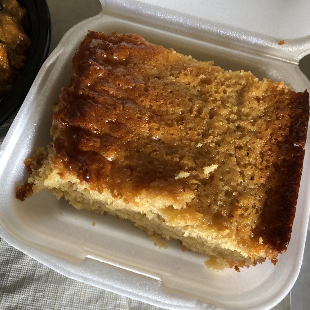 Latinas Kitchen - a piece of cake in a styrofoam container - Puerto Rican Near Me Latinas Kitchen - a piece of cake in a styrofoam container - Puerto Rican Near Me