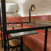 Photo of Bar Bombón - Philadelphia, PA, United States. Comfortable seating with very nice partitions.