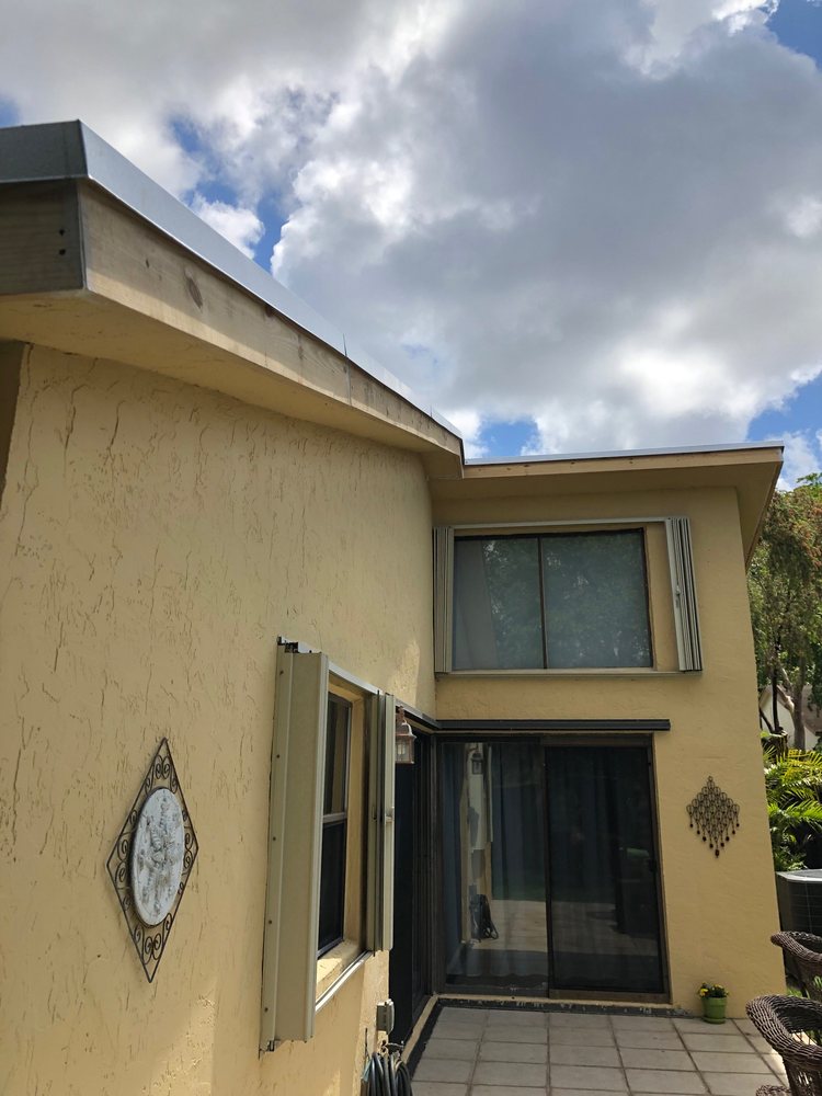 Slide of South Miami Roofing