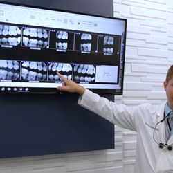 Sachse Family Dentistry - Dr. Rottman presenting x-rays