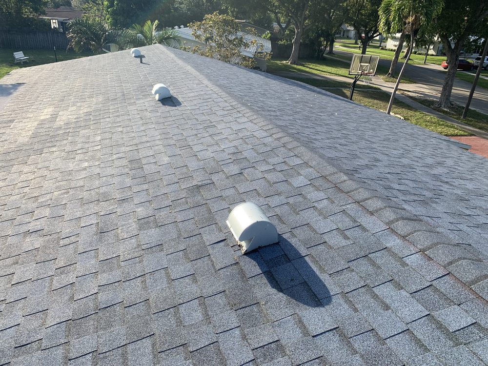 Slide of H American Roofing