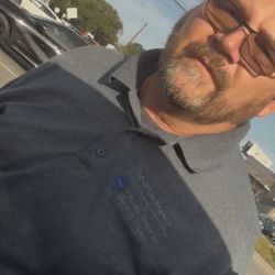 Federal Reserve Bank - Houston - Road rager wearing company shirt