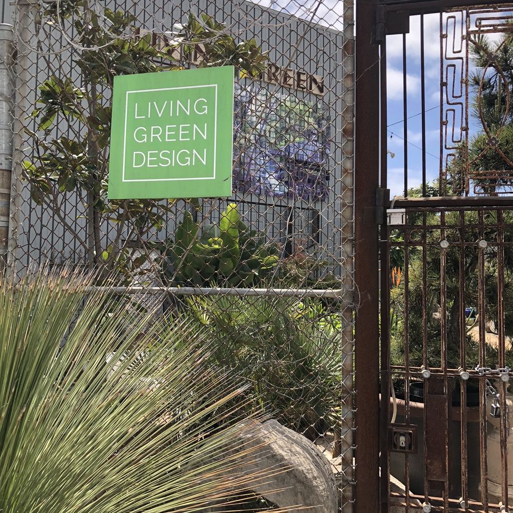 Living Green Design - a sign in front of a gate - Landscaping Near Me Living Green Design - a sign in front of a gate - Landscaping Near Me