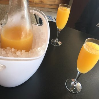 Tapester's Grill - Carafe of mimosas - American Near Me - Houston, Texas Tapester's Grill - Carafe of mimosas - American Near Me - Houston, Texas