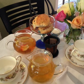 Tea List - scones with cream and jam, (nearest pot) Rooibos vanilla bourbon tea, (furthest pot) Long Island Strawberry ice tea - Coffee & Tea Near Me - Davis, California Tea List - scones with cream and jam, (nearest pot) Rooibos vanilla bourbon tea, (furthest pot) Long Island Strawberry ice tea - Coffee & Tea Near Me - Davis, California