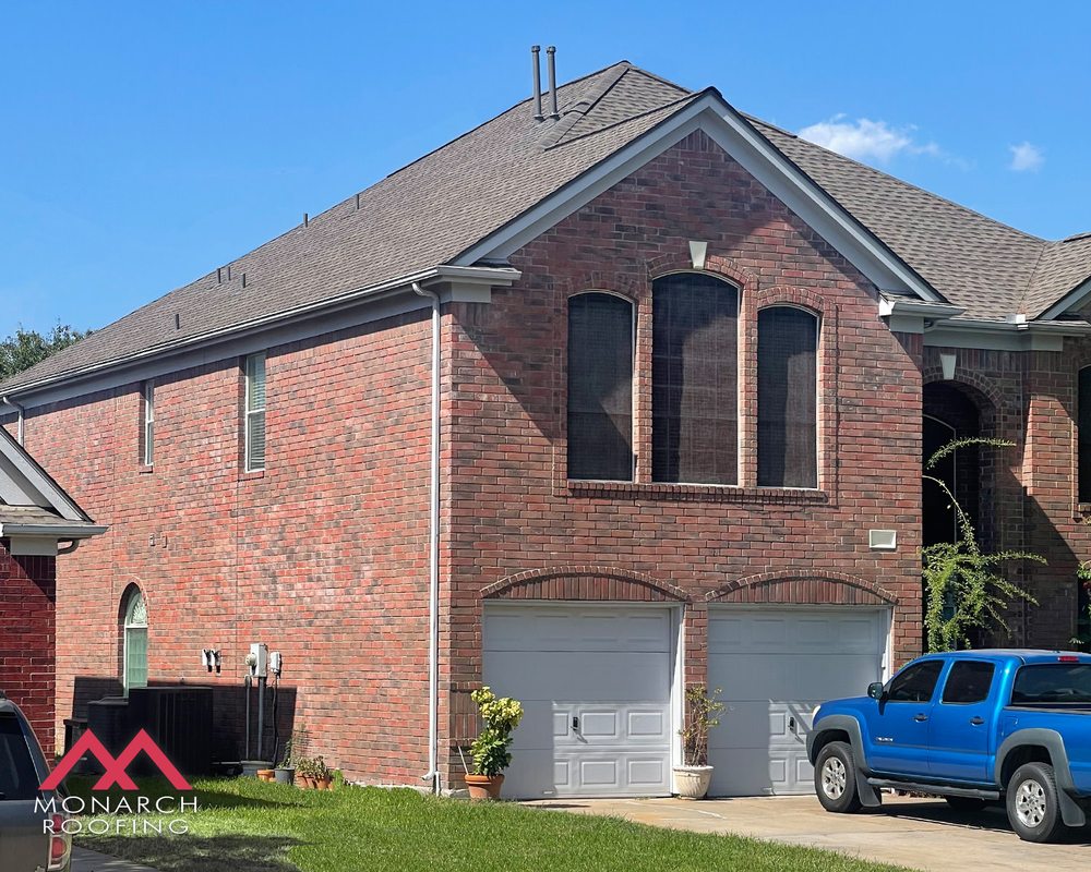 Slide of Monarch Roofing