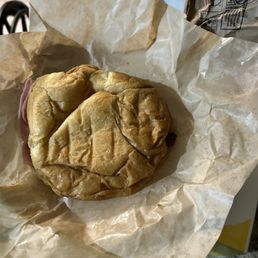 Ham, bacon, cheese and egg croissant.