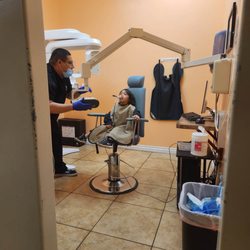 PhD Dental Inglewood - Time to do the x-ray, he's focused and he likes it