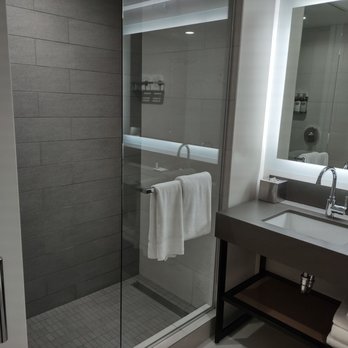 Hyatt Regency Seattle - Bathroom with half door big shower. - Hotels Near Me - Seattle, Washington Hyatt Regency Seattle - Bathroom with half door big shower. - Hotels Near Me - Seattle, Washington