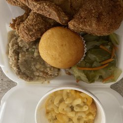 Brown’s Kitchen - Fried pork chop dinner cabbage, dressing and Mac and cheese