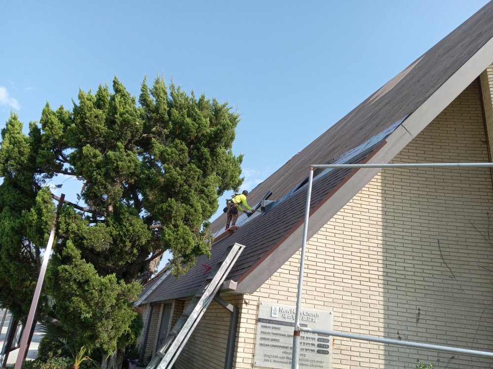 Slide of Reno's Roofing