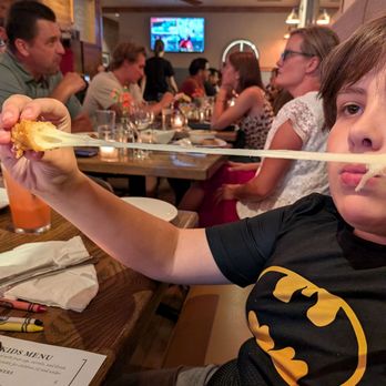 The Coopers Tavern - Cheese curd cheese pull - New American Near Me - Madison, Wisconsin The Coopers Tavern - Cheese curd cheese pull - New American Near Me - Madison, Wisconsin