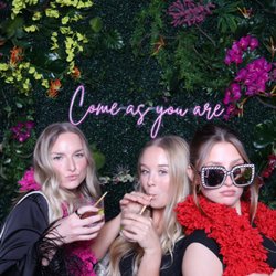 VR Squad - Corporate holidays Photo Booth with green hedges backdrop