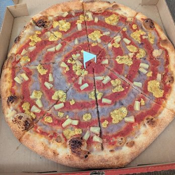 Sizzle Pie - Vegan! House red sauce, creamy caramelized onion spread, tofu cheese dollops, & pineapple bits. - Pizza Near Me - Portland, Oregon Sizzle Pie - Vegan! House red sauce, creamy caramelized onion spread, tofu cheese dollops, & pineapple bits. - Pizza Near Me - Portland, Oregon