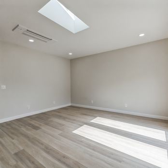 Freedom Renovation - empty living room with skylight - General Contractors Near Me - San Diego, California Freedom Renovation - empty living room with skylight - General Contractors Near Me - San Diego, California