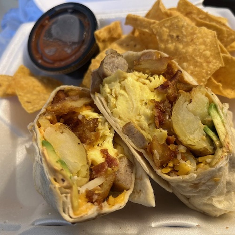 Brass Fork - Brass Fork Breakfast Burrito - scrambled eggs, hash browns, bacon, sausage, cheddar cheese, jack cheese, avocado, chipotle cream - Cafes Near Me - Henderson, Nevada