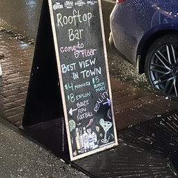 a chalk board on the sidewalk a chalk board on the sidewalk