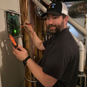 Full Time Heating & Cooling - HVAC tech working on a zone control system to optimize temperature regulation in the home. - Heating & Air Conditioning/HVAC Near Me - Watertown, Minnesota Full Time Heating & Cooling - HVAC tech working on a zone control system to optimize temperature regulation in the home. - Heating & Air Conditioning/HVAC Near Me - Watertown, Minnesota