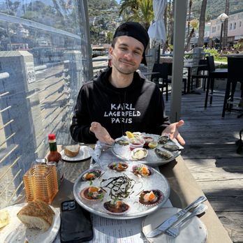 Bluewater Grill - It's me enjoying oysters and scallops - Seafood Near Me - Avalon, California Bluewater Grill - It's me enjoying oysters and scallops - Seafood Near Me - Avalon, California