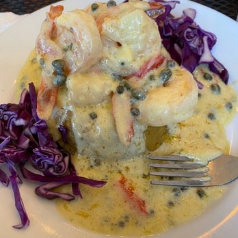 La Parrilla - Mofongo de platano maduros con camarones en salsa de queso holandes (shrimp mofongo with sweet plantains in a cheese fondue sauce). - Latin American Near Me - Luquillo, Puerto Rico La Parrilla - Mofongo de platano maduros con camarones en salsa de queso holandes (shrimp mofongo with sweet plantains in a cheese fondue sauce). - Latin American Near Me - Luquillo, Puerto Rico