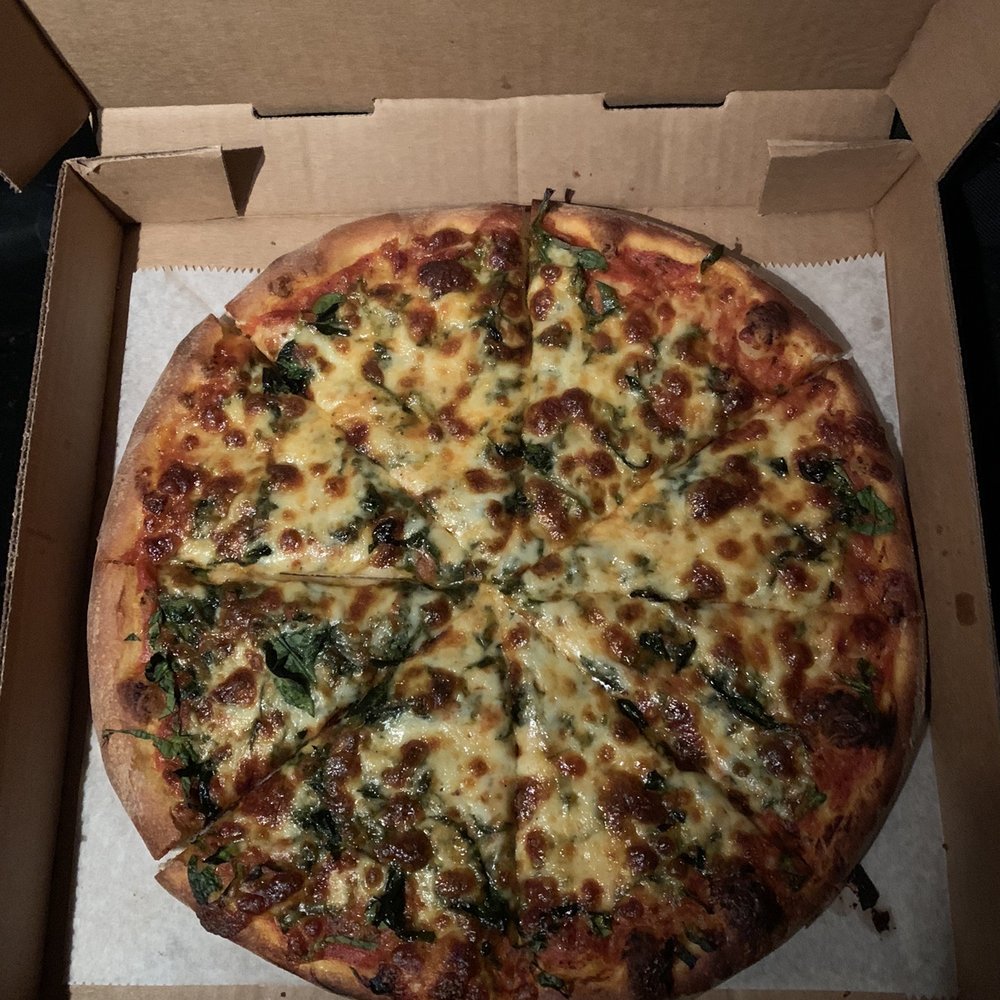 Neopolitan cheese pizza with spinach