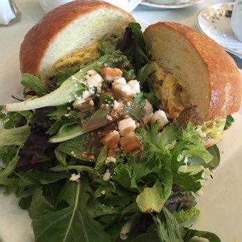 Chat Noir - Curry chicken salad on brioche roll with a yummy green salad on the side - Tea Rooms Near Me - Rockville Centre, New York Chat Noir - Curry chicken salad on brioche roll with a yummy green salad on the side - Tea Rooms Near Me - Rockville Centre, New York