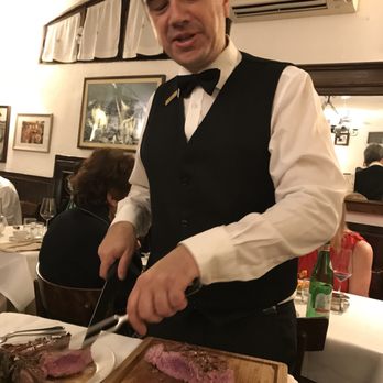 Buca Mario - Our server cut up the steak at the table carefully sectioning off the filet and strip portions. - Tuscan Near Me - Florence, FI Buca Mario - Our server cut up the steak at the table carefully sectioning off the filet and strip portions. - Tuscan Near Me - Florence, FI