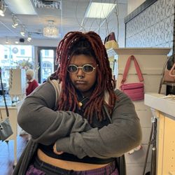 Bangles & Bags - My daughter trying on glasses