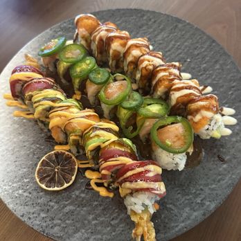 Sushi Island - (Left to right) Fat boy roll, Crazy yellowtail roll, and Spicy girl roll - Japanese Near Me - Winter Park, Florida Sushi Island - (Left to right) Fat boy roll, Crazy yellowtail roll, and Spicy girl roll - Japanese Near Me - Winter Park, Florida