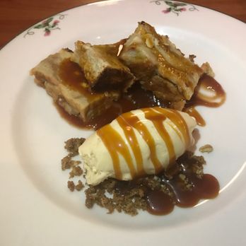 Big Jones - Rum Bread Pudding  Boozy pudding served warm with homemade apple butter and vanilla bean ice cream - Southern Near Me - Chicago, Illinois