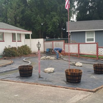 Bruce Ruhnow Landscape & Design, LLC - two men working on a patio - Landscaping Near Me Bruce Ruhnow Landscape & Design, LLC - two men working on a patio - Landscaping Near Me