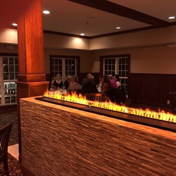 Filly & Colts - Fire feature in Dining Room. - American Near Me - Whispering Pines, North Carolina Filly & Colts - Fire feature in Dining Room. - American Near Me - Whispering Pines, North Carolina
