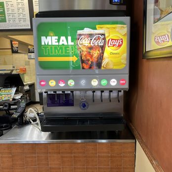Subway - a soda dispenser with a menu in the background - Sandwiches Near Me - Miami, Florida Subway - a soda dispenser with a menu in the background - Sandwiches Near Me - Miami, Florida